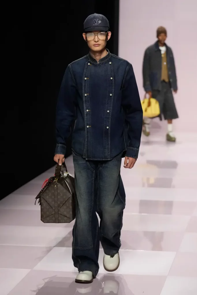 "Pharrell Williams Paris Fashion week"Denim flooded the Louis Vuitton runway (Michel Euler/AP)